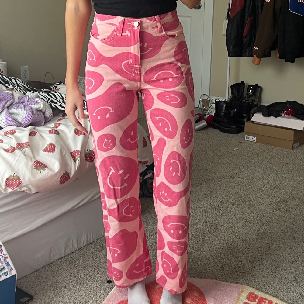Pink smiley face wide leg jeans